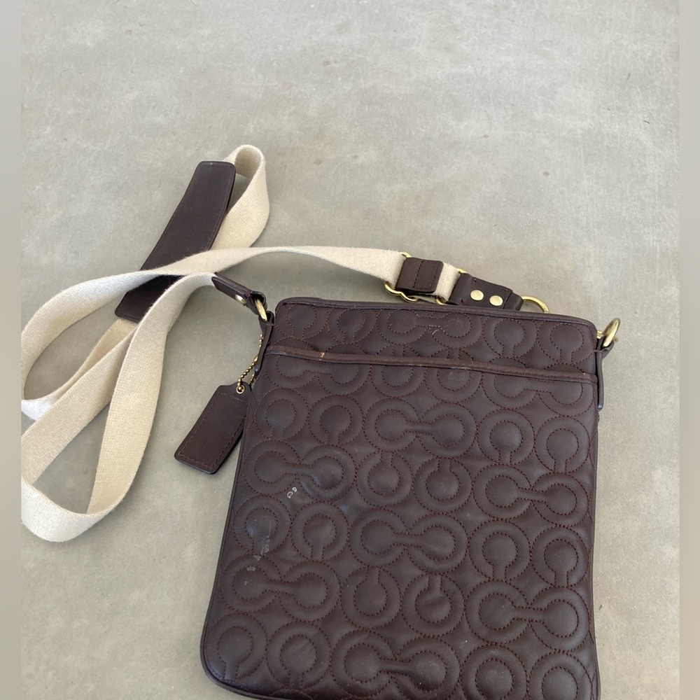 Coach bag with gold accents